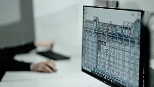 Computer screen showing a technical model of an automatic door structure during the design phase.