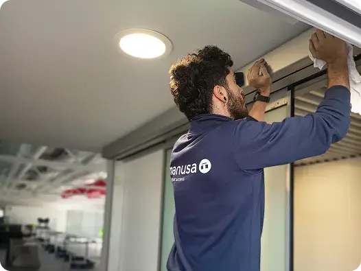 Manusa technician installing automatic door system.